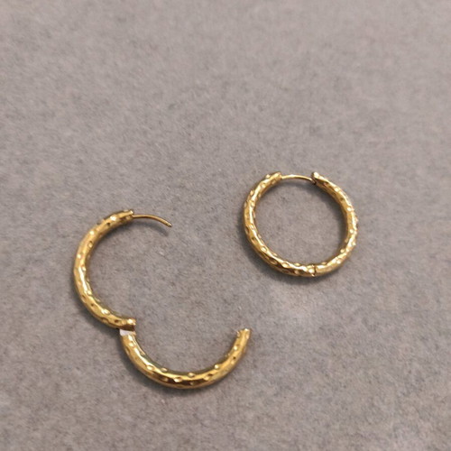Steel earrings in gold color like new