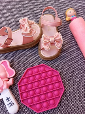 Pink children's sandals with bows and summer gifts, size 24