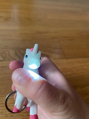 Unicorn keychain flashlight like new with horse neigh sound