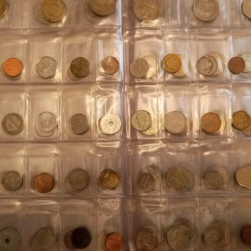 Coin album used with 159 coins from various countries