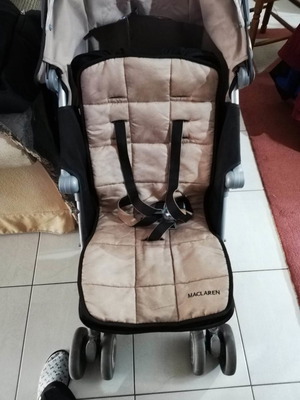 Maclaren Techno XLR stroller used with accessories and rain cover