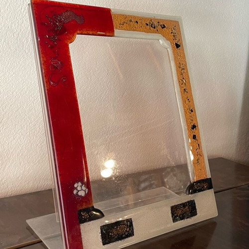 Glass photo frame colored with plexiglass used