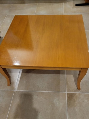 Wooden coffee table used with wear marks