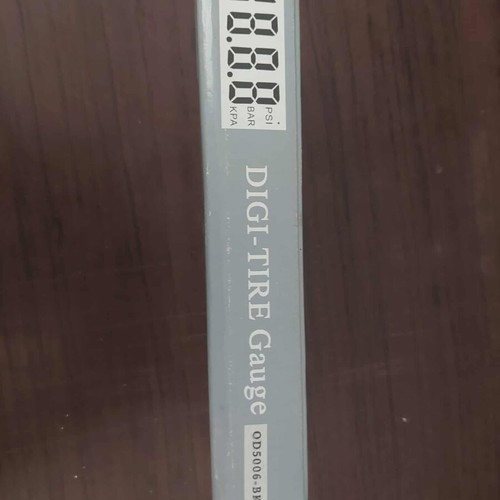 Digital tire pressure gauge in box