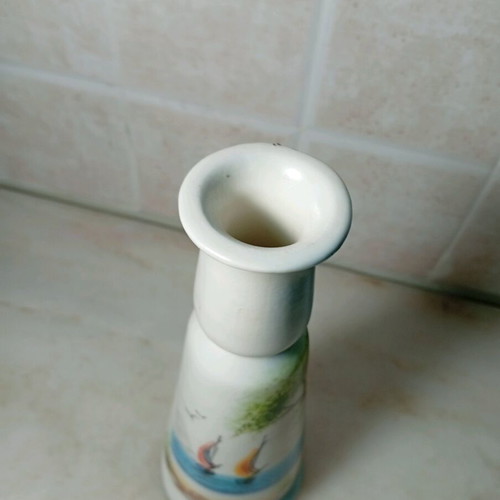 Decorative ceramic candle holder with painted sailboats like new