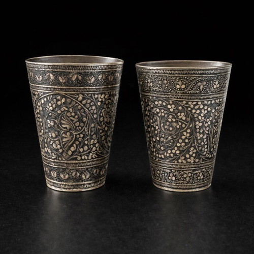 Set of 2 used carved metal cups made of silver-plated bronze