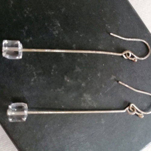 Silver earrings with crystal used