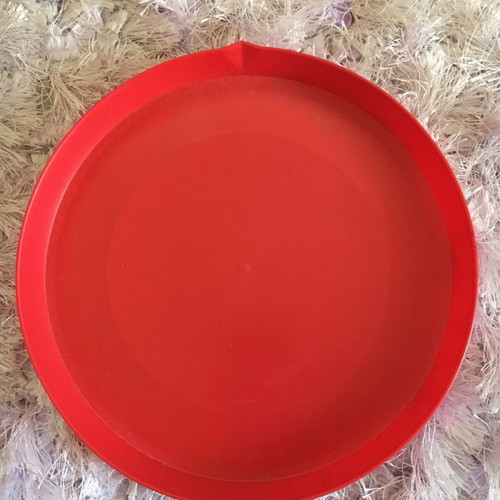Red frisbee new and unused