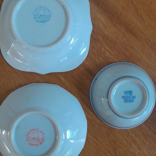 Porcelain plates and miniature bowls, old unused