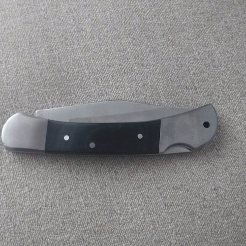Metal folding knife with stainless blade like new