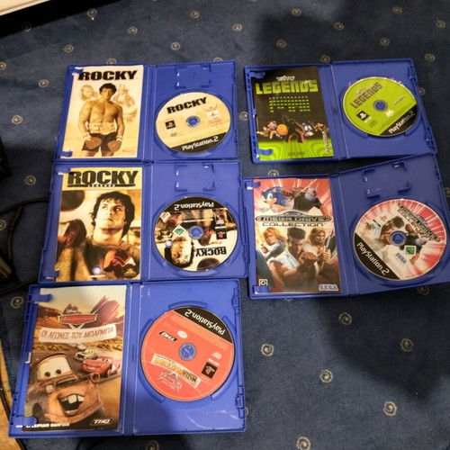 PlayStation 2 used with games, controller and memory