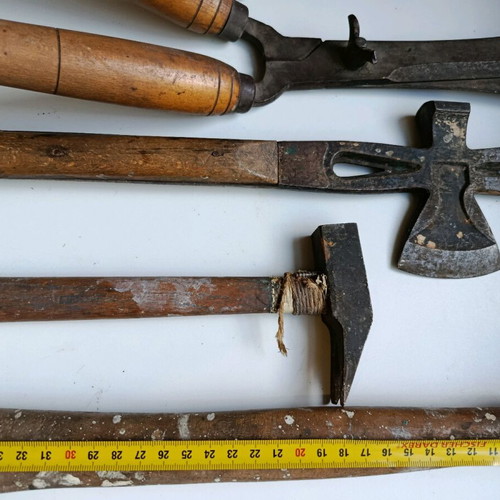 Set of old handmade tools used with wooden handles