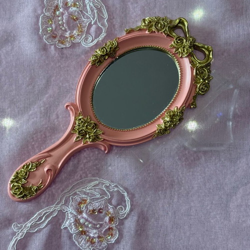Vintage pink hand mirror like new