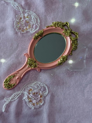 Vintage pink hand mirror like new