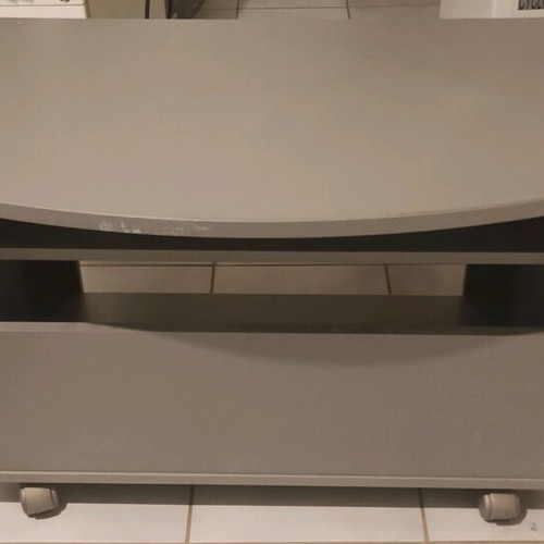 TV stand used, silver color with storage shelf