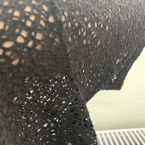 Black perforated blouse like new, medium size, loose fit