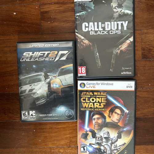 Set of one game and two empty cases used