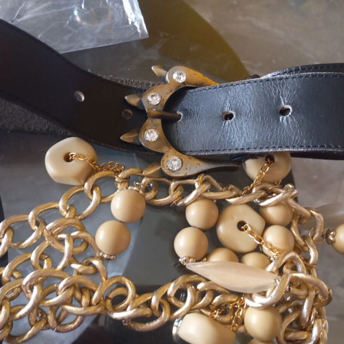 Belts used, black and gold, size 75