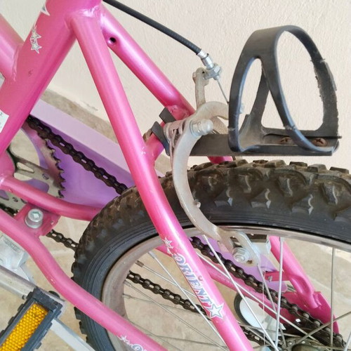 Girls BMX bike used with training wheels