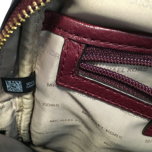 Michael Kors genuine leather backpack used, red