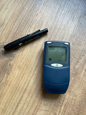 Accu-Check Compact with lancet device used