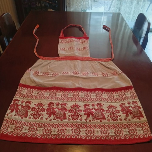Vintage kitchen apron with traditional folk art motifs 1950