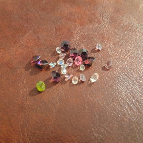 Semi-precious and precious stones like new, set of 23, round cut