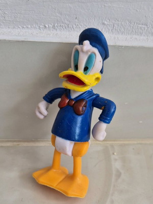Donald Duck figure used with movable arms, legs, and head
