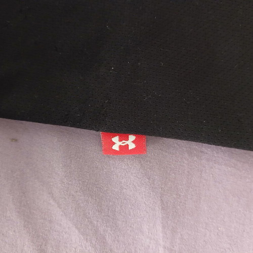 Under Armour short sleeve sports shirt, black and blue, size M