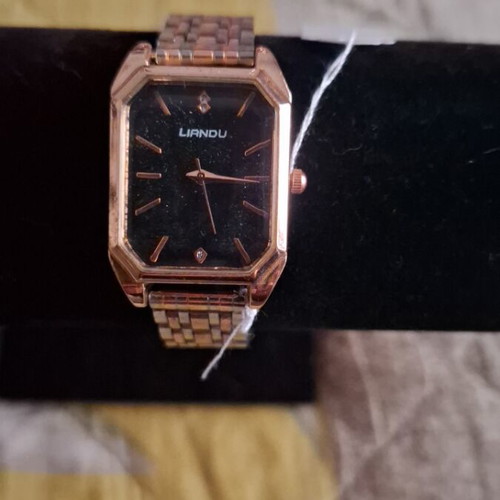 Wristwatch new with rose gold and silver bracelet