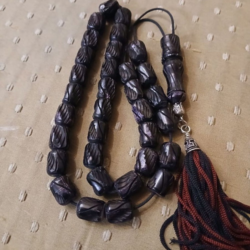 Komboloi bone engraved worry beads used with metal elements and tassel