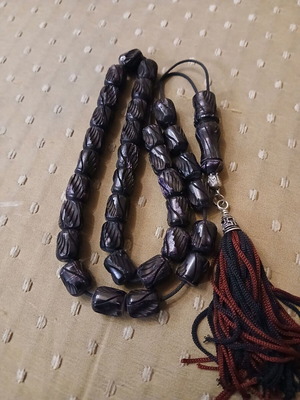 Komboloi bone engraved worry beads used with metal elements and tassel