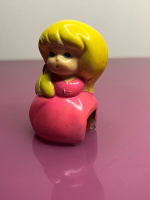 Vintage ceramic doll sharpener used with minimal paint wear