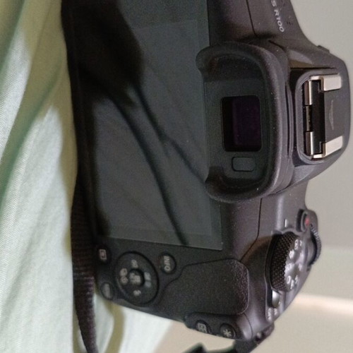 Canon R-100 camera like new with tripod and three lenses