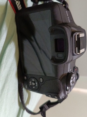 Canon R-100 camera like new with tripod and three lenses
