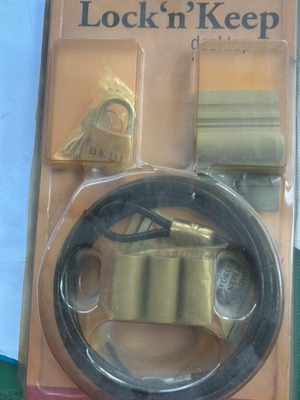 Lock 'n' Keep XSRE laptop lock for peripherals, collectible
