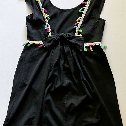 Dress with open back and bow used, black with colorful tassels