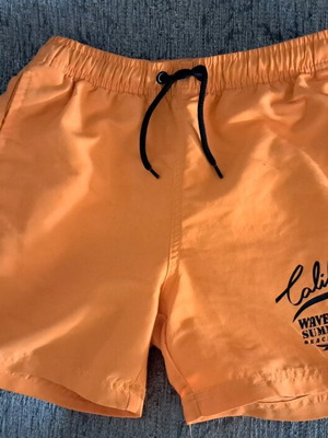 Orange swim shorts for boys 9-10 years, like new, size 134-140 cm