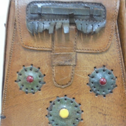 Vintage leather handbag with decorative ornaments, used, brown