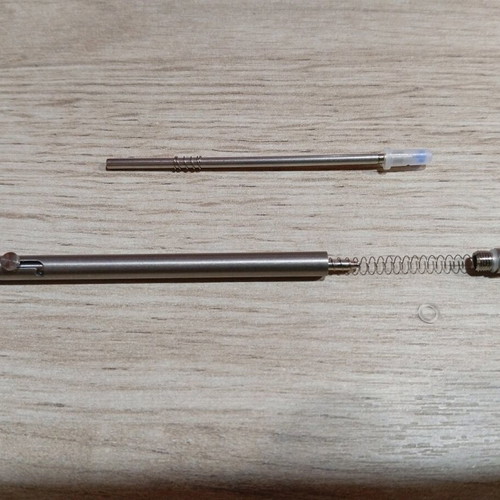 Mini titanium pen like new