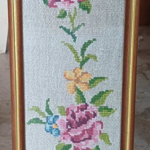 Two large paintings and four small frames __ hand-stitched along with frames__ all