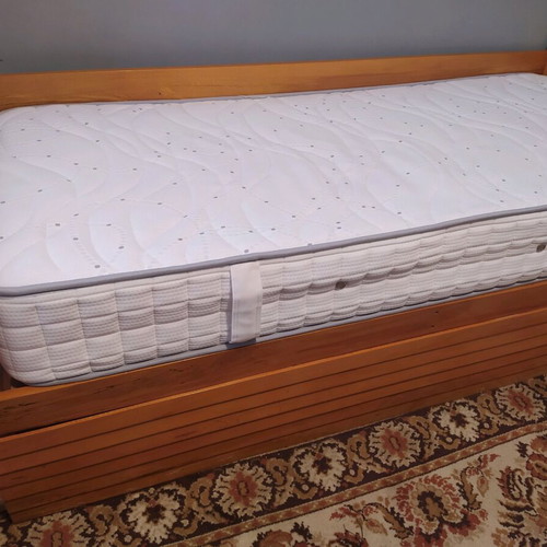Wooden sofa bed with storage and new Mediastrom mattress used