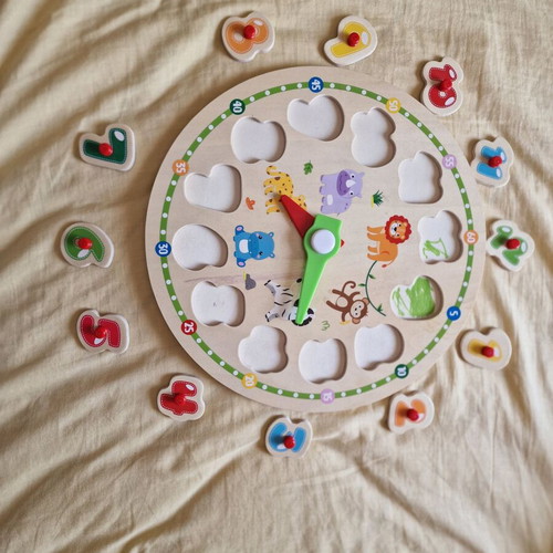 Wooden clock puzzle used with marker stains