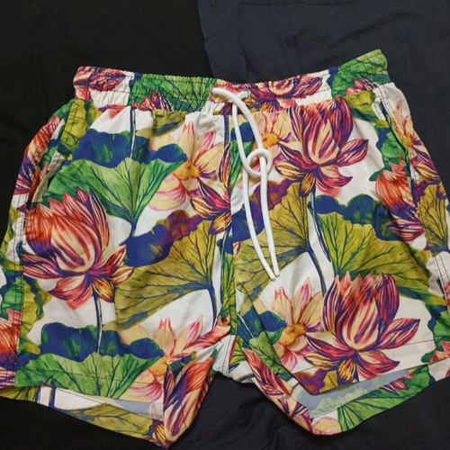 Men's swimwear like new with colorful floral design