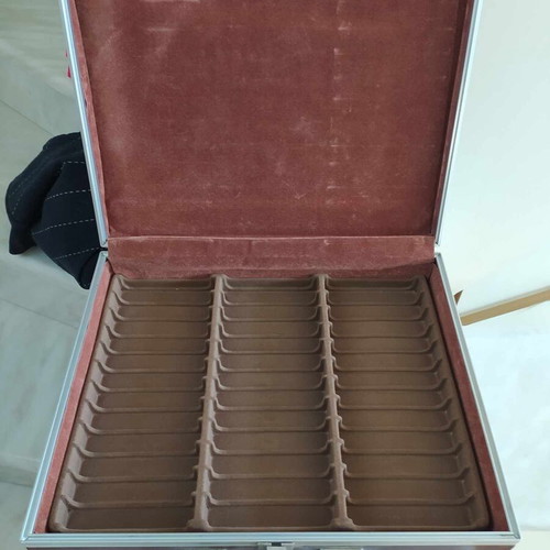 Leather cassette case used for 36 tapes with velvet interior