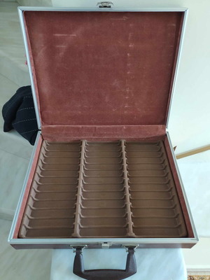 Leather cassette case used for 36 tapes with velvet interior