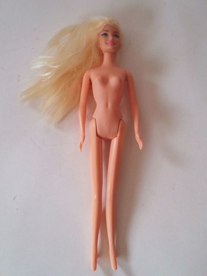 Barbie doll with blonde hair and blue eyes used