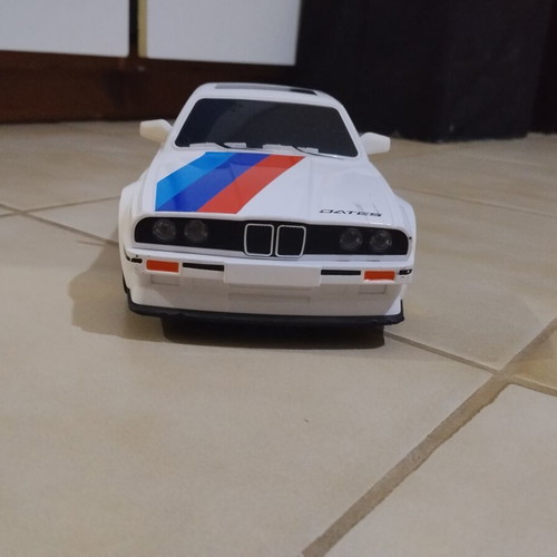 Electric toy car with drift and on-road wheels