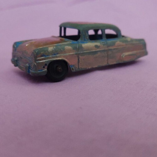 Tootsie Toy Blue Ford 1950s used, missing one wheel, aged wear