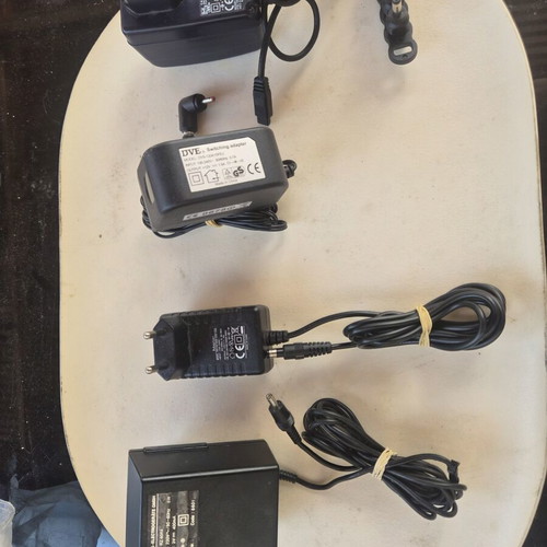 Adjustable power chargers with various plugs for electronics and laptops